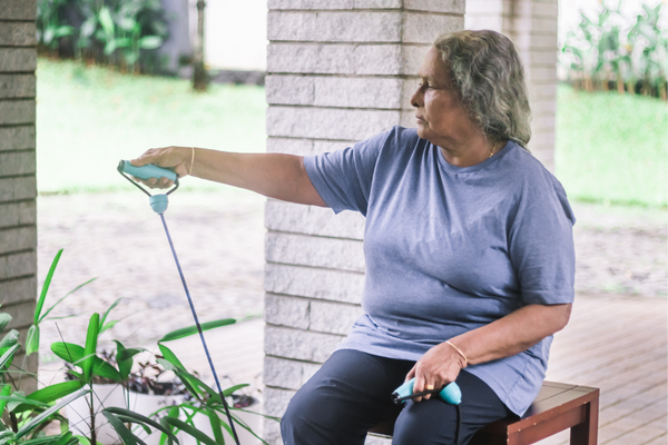 Older lady with resistance bands