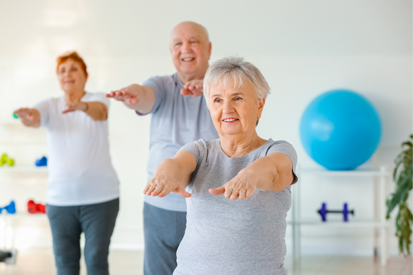 Elderly in yoga class